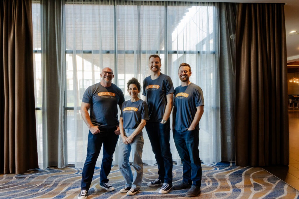 Walla Walla Orthodontics doctors wearing matching team shirts in group portrait